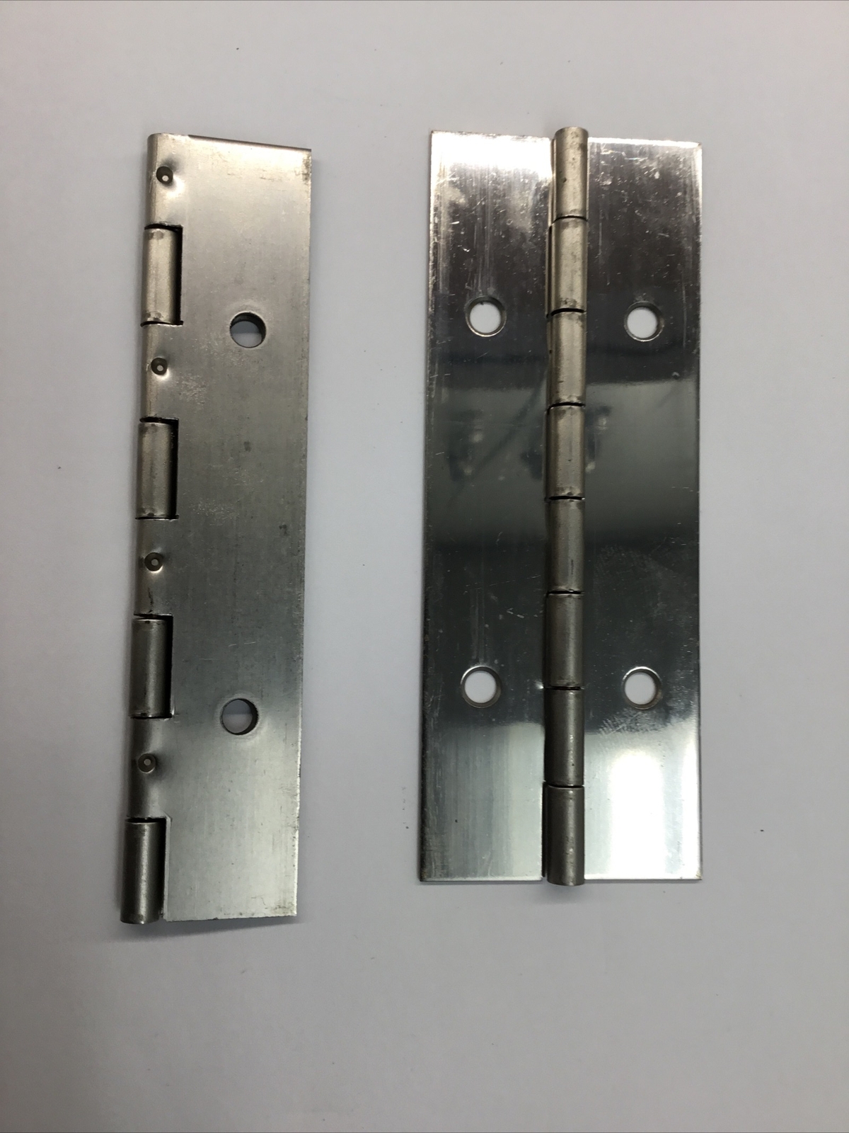 Stainless Steel Continuous Hinge 2 piece Lot with holes 4" long X 1 1/2" wide gallery