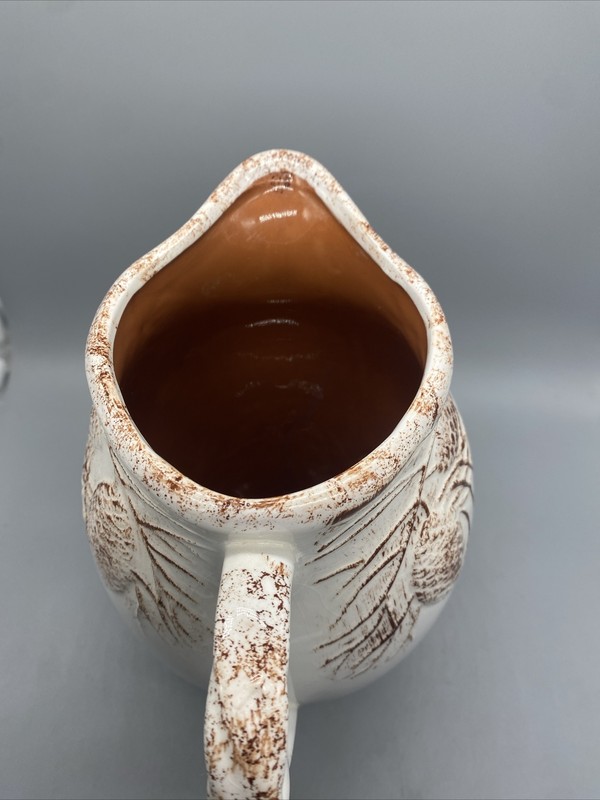 NEW Creative co-op 9"H Dolomite Pitcher with Pine Cones Beige/Terra Cotta gallery