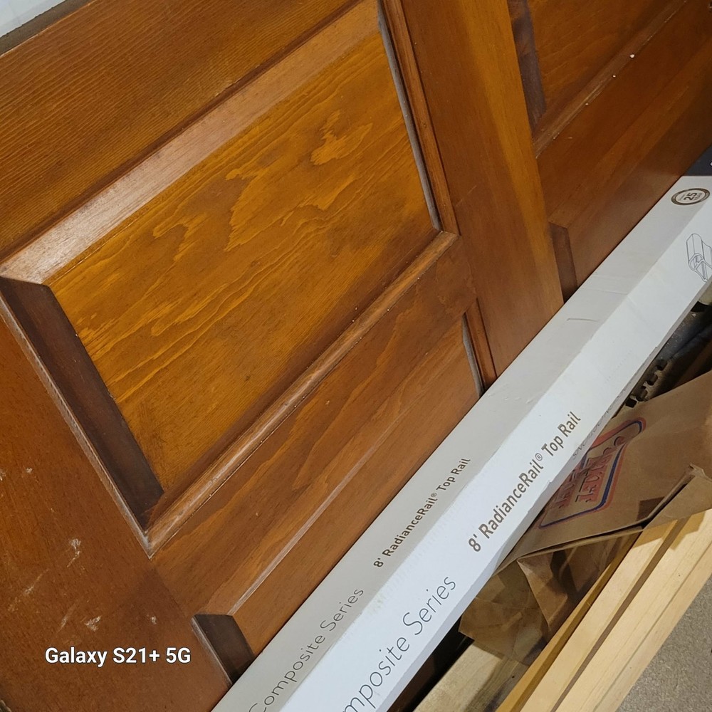 over sized pine solid wood door on hinges.