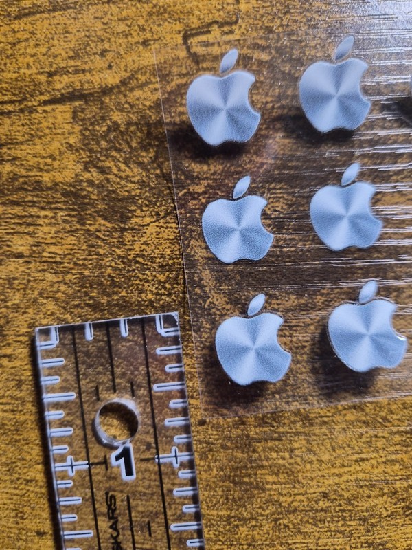 9 pc. Apple Logo Metallic Silver 5/8 in tall UV DTF Decal Sticker waterproof USA gallery