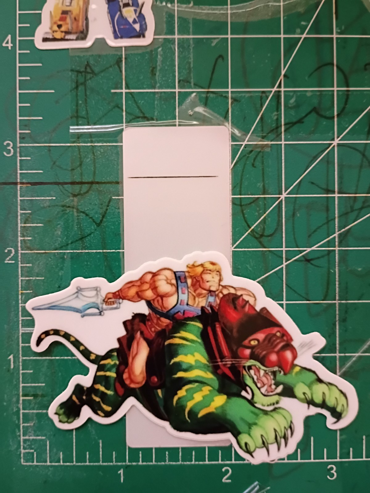 HE-MAN STICKER X VYNIL HIGH GLOSS DIECUT STICKER X 3X2 INCHES STICKER gallery