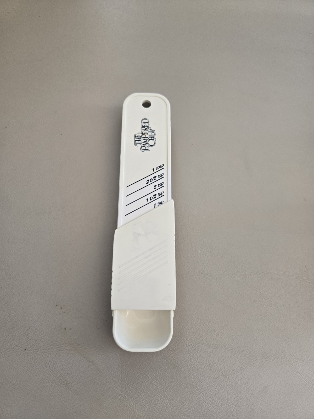 Vintage Pampered Chef Adjustable 1 TSP. - 1 TBSP Measuring Sliding Spoon gallery