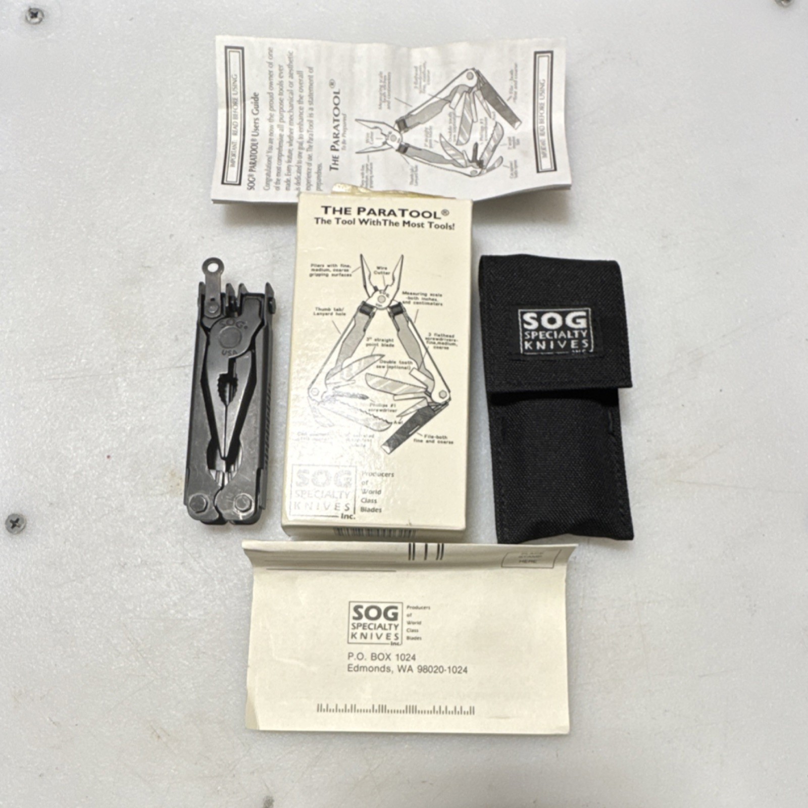 SOG Paratool Black Oxide Multi-Tool Pliers Folding, Nylon Sheath, Slightly Used! gallery