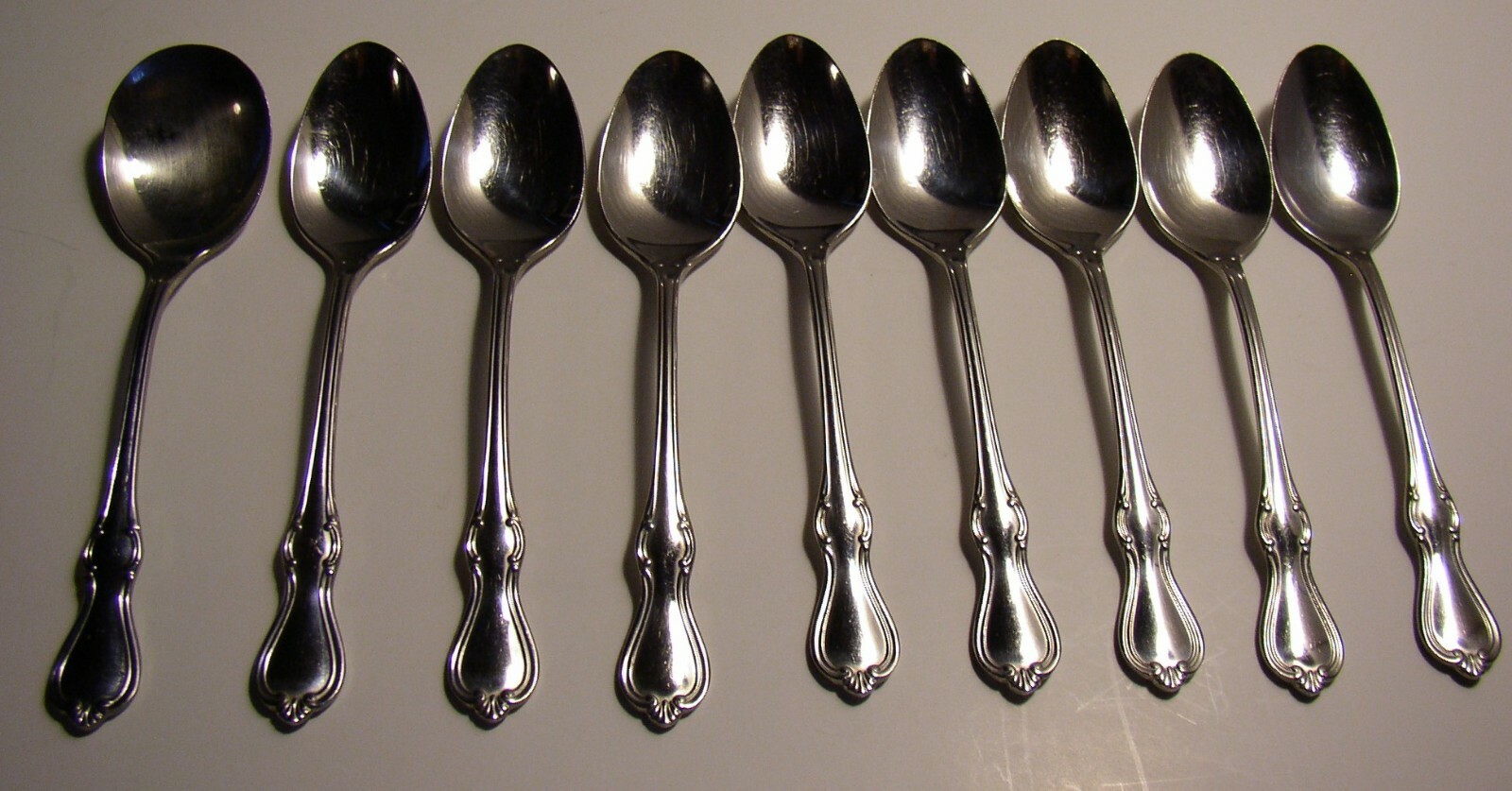 9 PC Reed & Barton CAMELOT Stainless 8 Teaspoons & 1 Sugar Spoon 6" gallery
