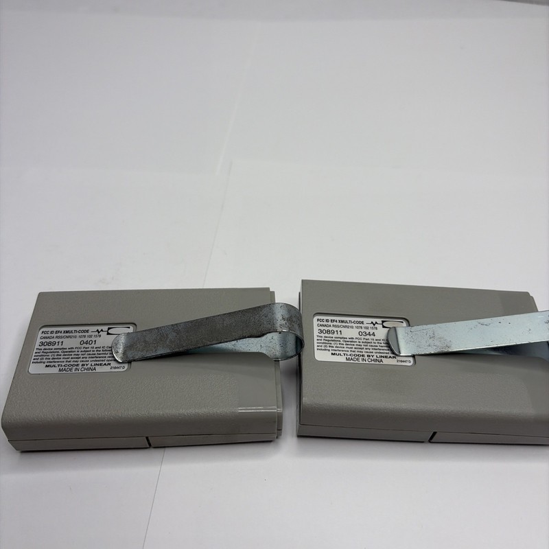 Multi-Code 0440 Linear Gate/Garage Opener 2 Remotes With Visor Clips,tested gallery