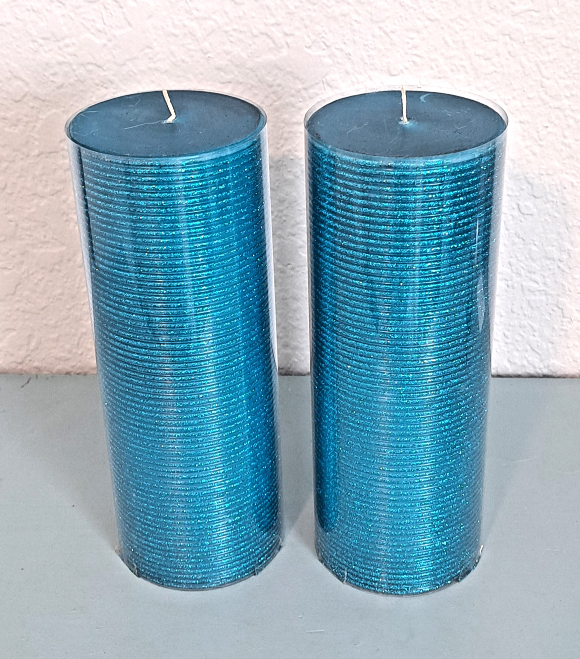 NEW ~ CRATE & BARREL (2) Shimmer Pillar Teal Blue 3x8 100 hrs. Burn time gallery