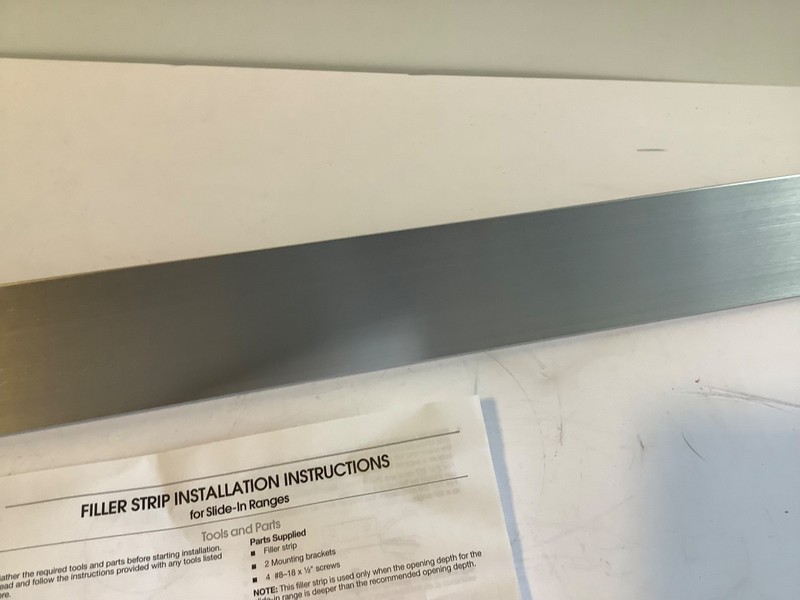 Whirlpool W10113901A Triangular Filler Strip Stainless Steel Trim OEM gallery