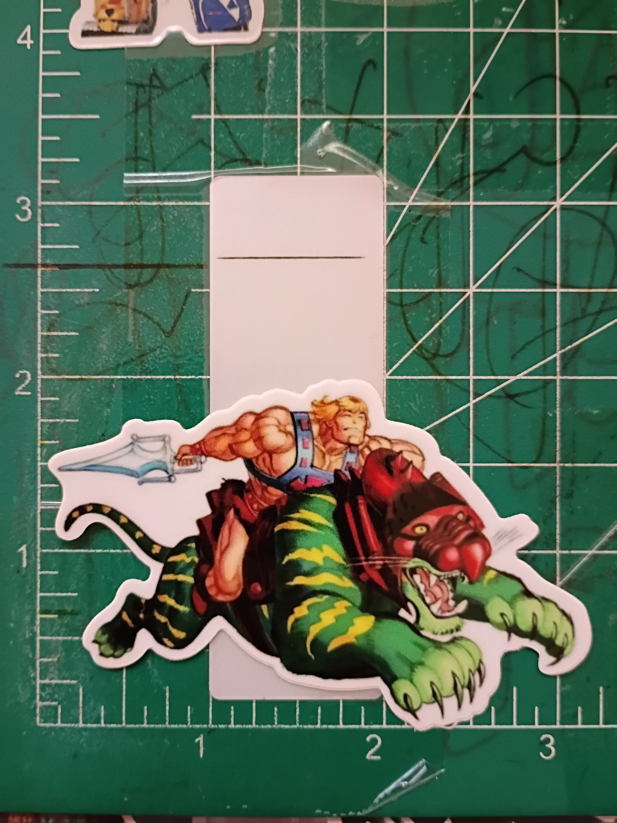HE-MAN STICKER X VYNIL HIGH GLOSS DIECUT STICKER X 3X2 INCHES STICKER gallery