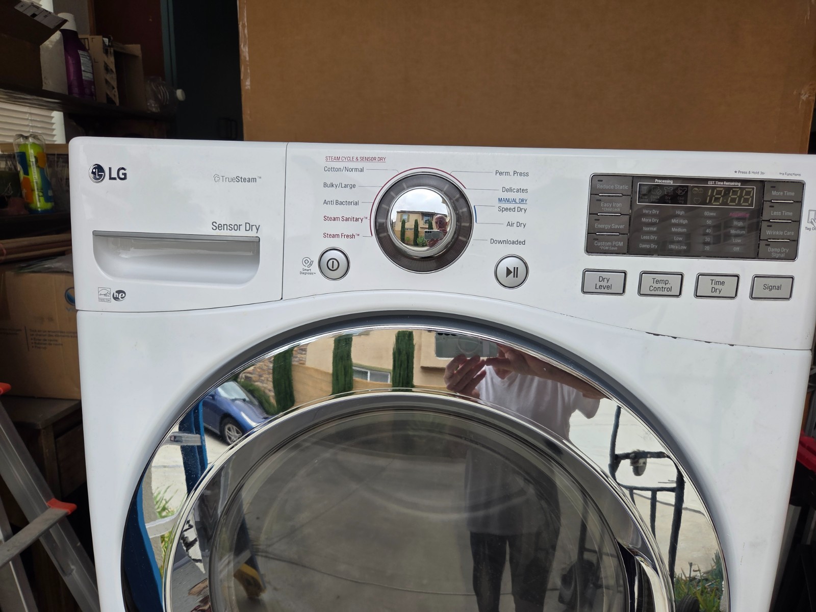 Used LG white front loading gas dryer in very good condition includes stand gallery