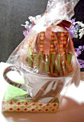 Wrapped gift ceramic coffee mug with Hot Chocolate, etc. Take a peak..