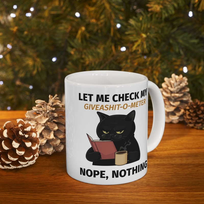 Funny Cat drinking Coffee Mug Stating "Let Me check my Give-o-Shit meter"Nope gallery