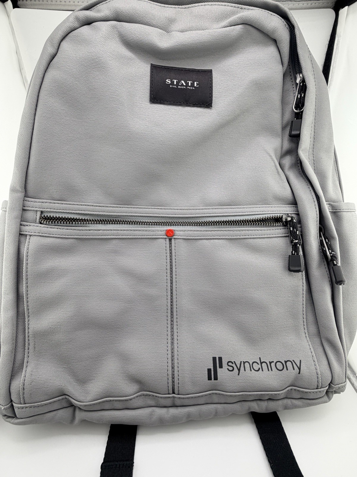 State Brand Grey Backpack Medium Sized With Synchrony Logo On Front