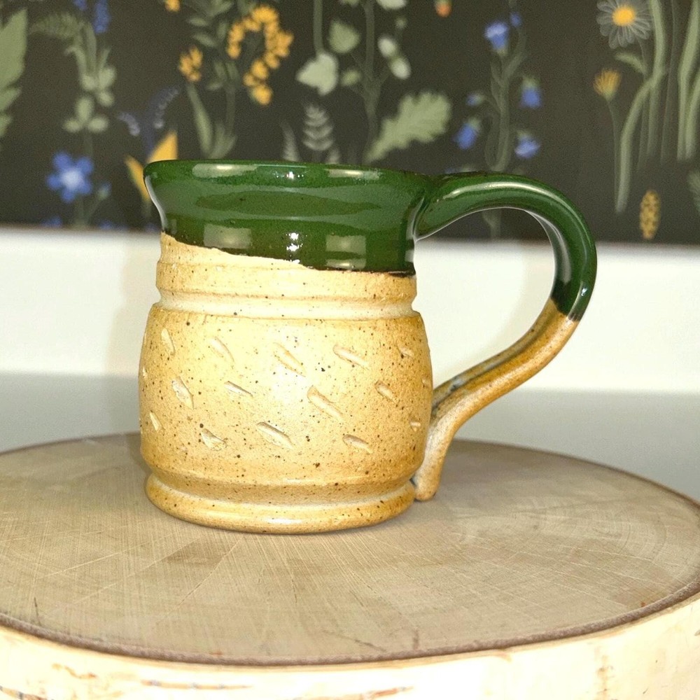 Rustic handmade studio pottery mug - etched tan with green speckled glaze
