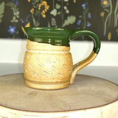 Rustic handmade studio pottery mug – etched tan with green speckled glaze