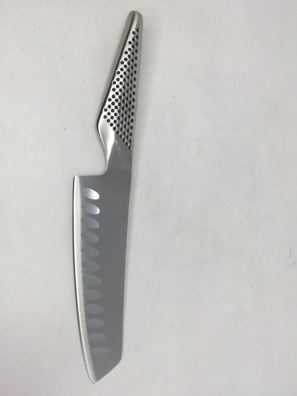 GLOBAL 5 1/2 inch, Vegetable Hollow Ground gallery