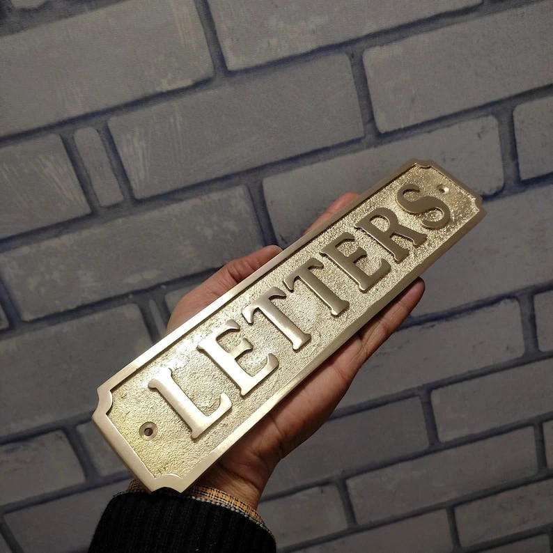 Cast Brass custom door signs & plaques - Custom language plaques - Custom name s
