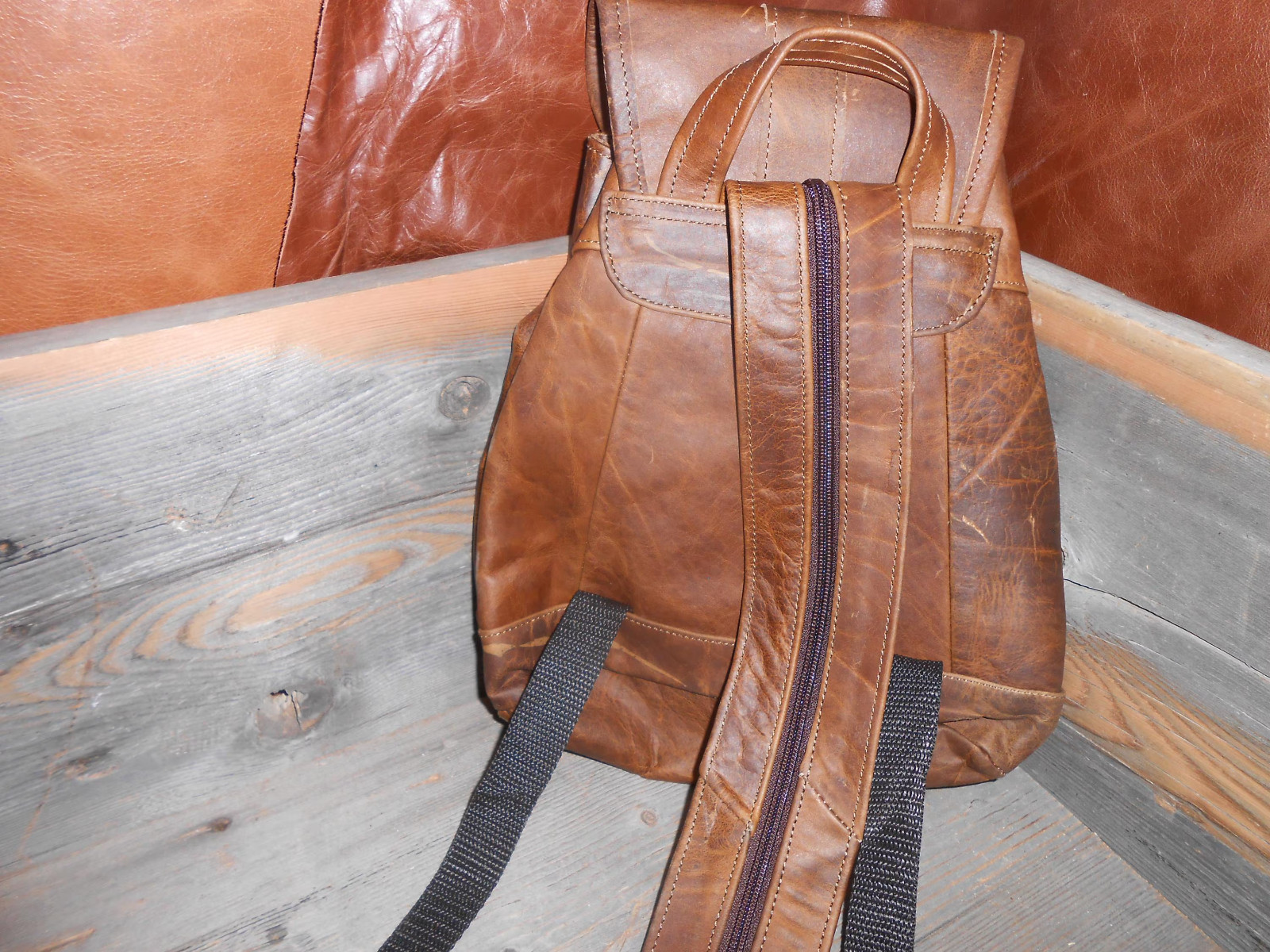 Leather backpack.New small to medium sized backpack spacious with zipper pockets 4