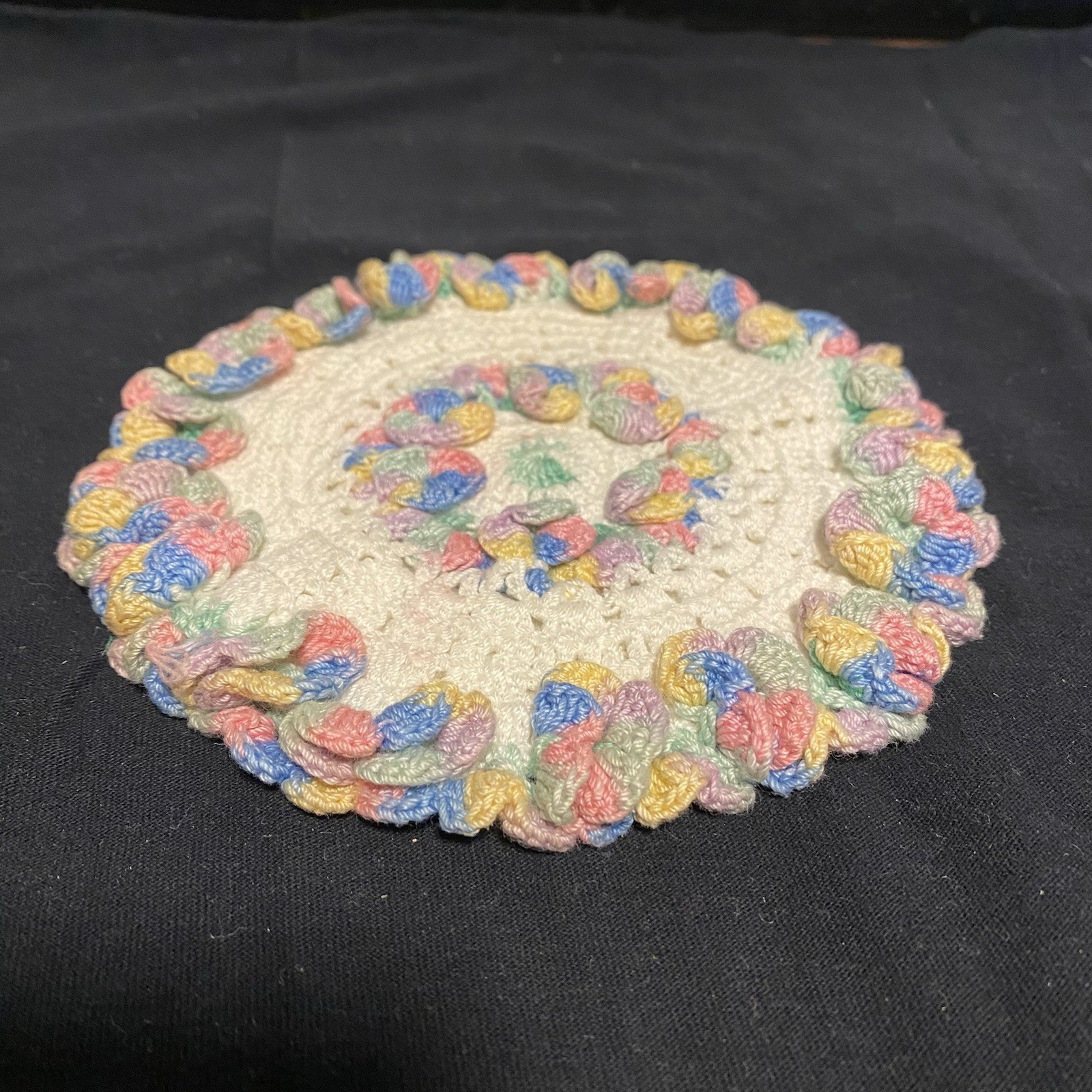 Hand Crocheted Round Vintage Trivet - Pink, Green, Blue & Yellow w/Frills gallery