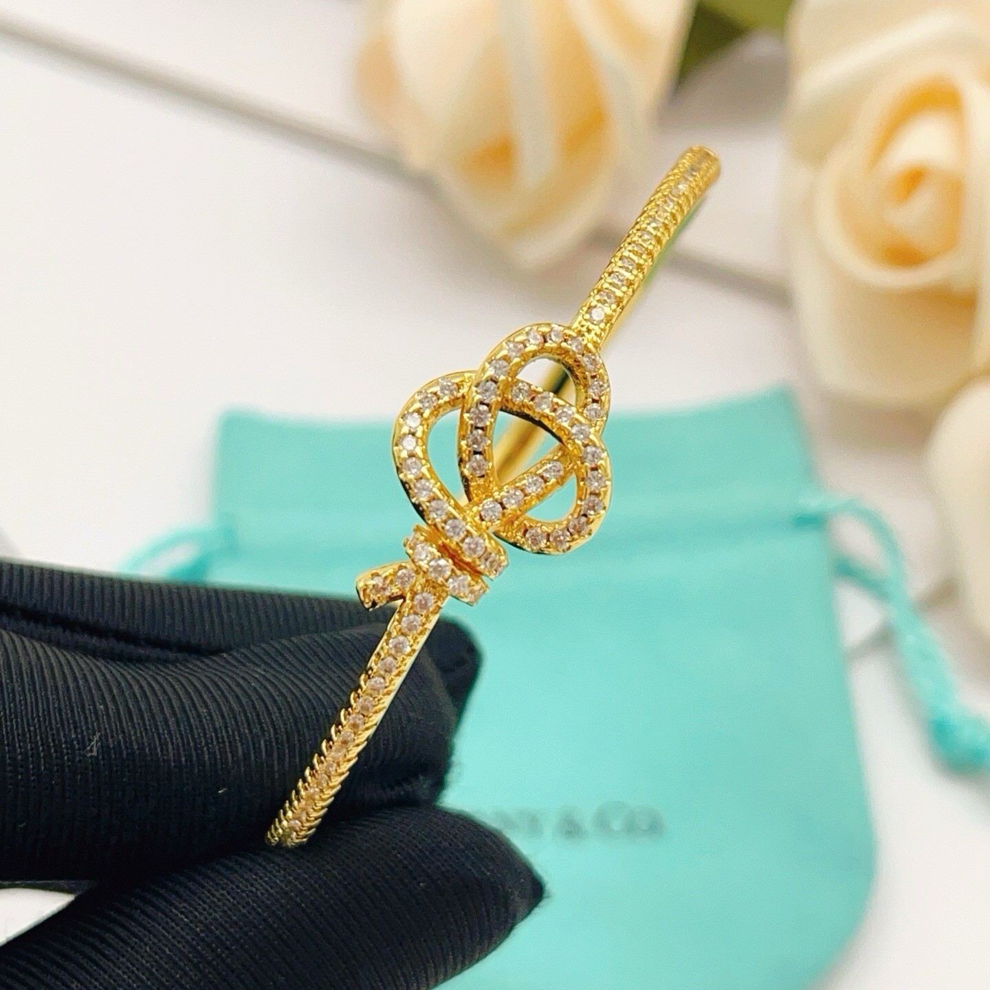 Tiffany & Co. 18K Yellow Gold Knot Hinged Bangle Bracelet, No Stone gallery