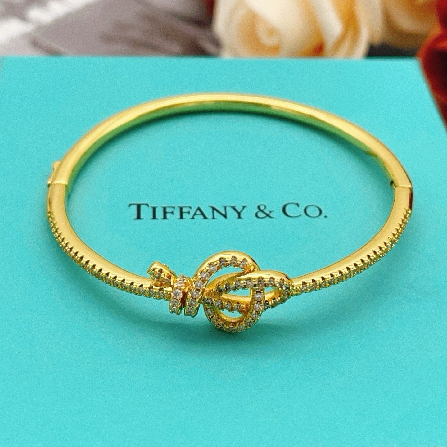 Tiffany & Co. 18K Yellow Gold Knot Hinged Bangle Bracelet, No Stone gallery