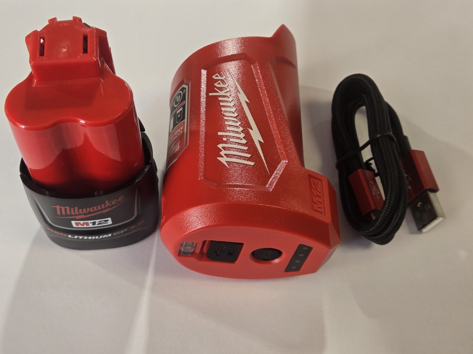 Milwaukee M12 Compact Charger & 3.0 Battery Kit 50-59-2423 with Battery Included gallery