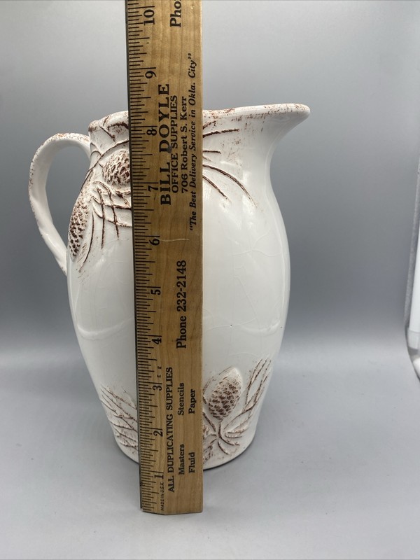 NEW Creative co-op 9"H Dolomite Pitcher with Pine Cones Beige/Terra Cotta gallery