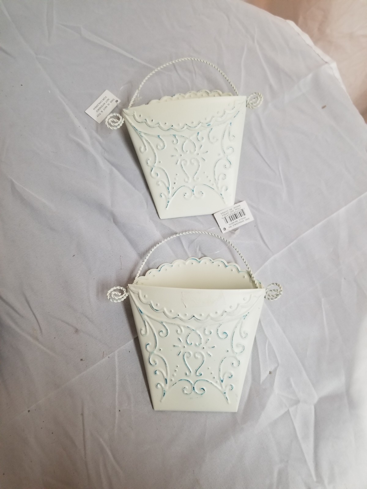 New With Tags Metal Ivory Distressed Wall Hanging Baskets With Raised Design... gallery
