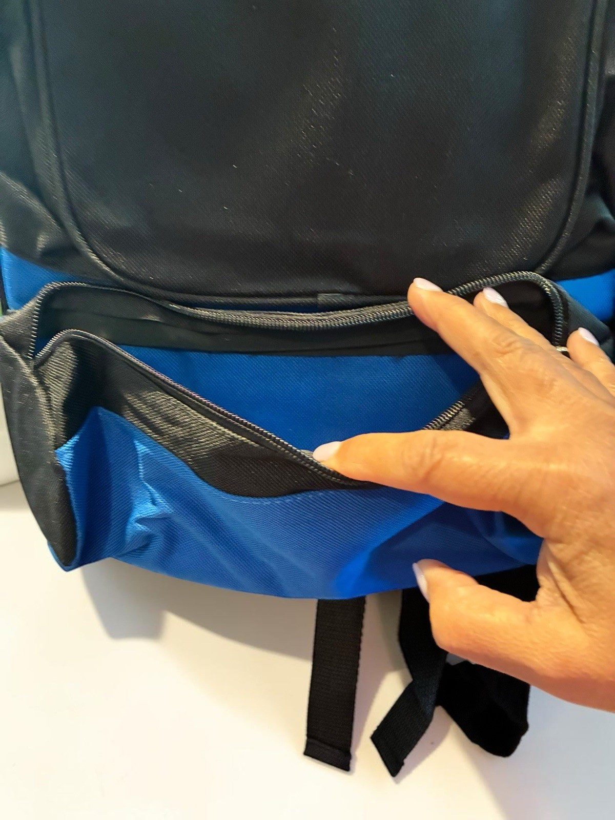 Black And Blue Backpack With Many Pockets. 3
