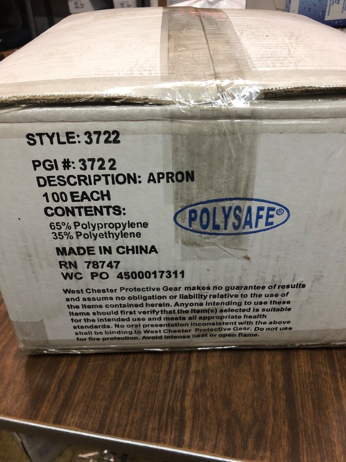 White disposable Polypropylene aprons case of 100 gallery