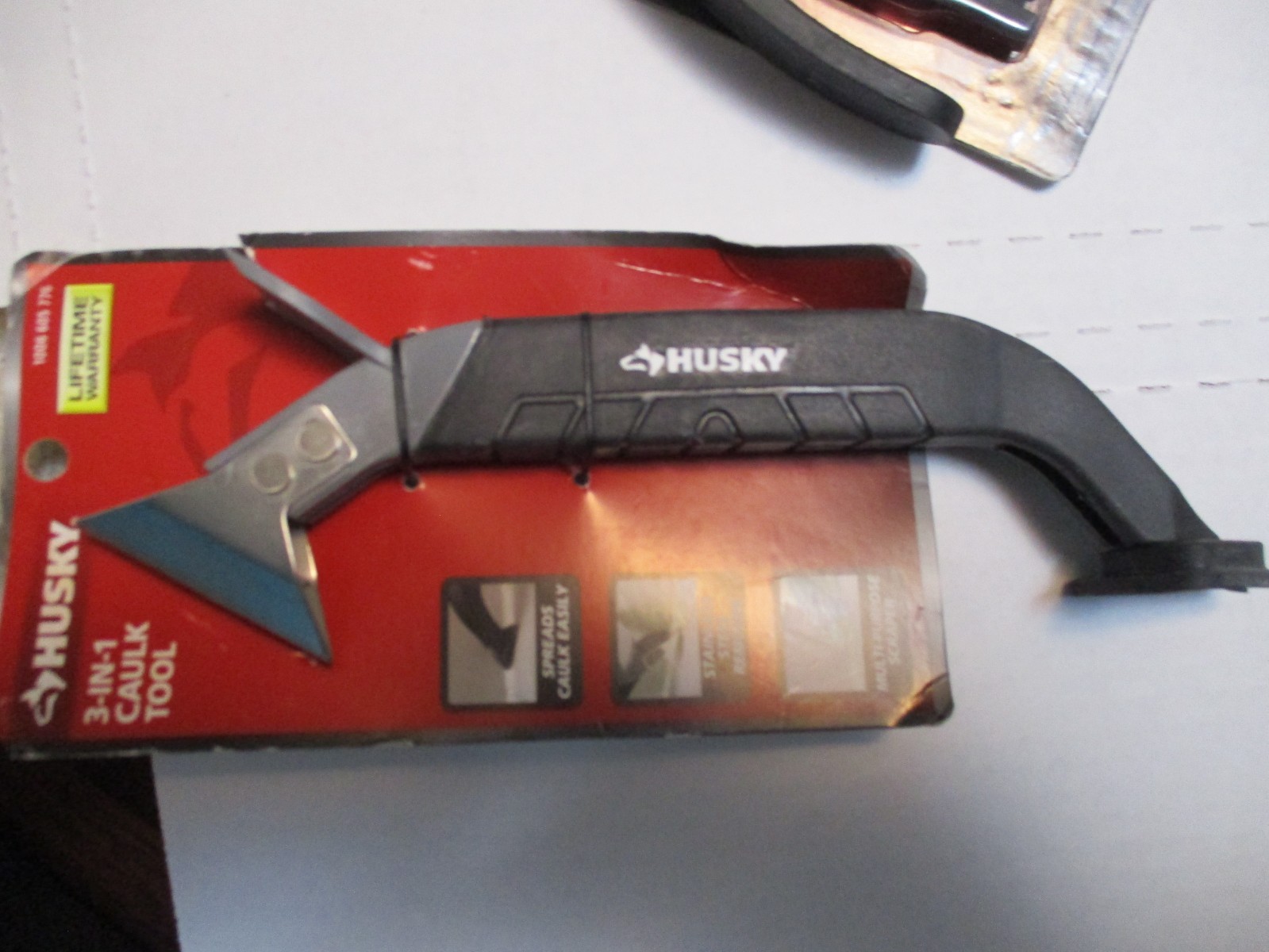 Husky 8 In. Strap Wrench, Plug Wrench, Coupler, Hex Key Set, 3 in 1 Caulk Tool gallery