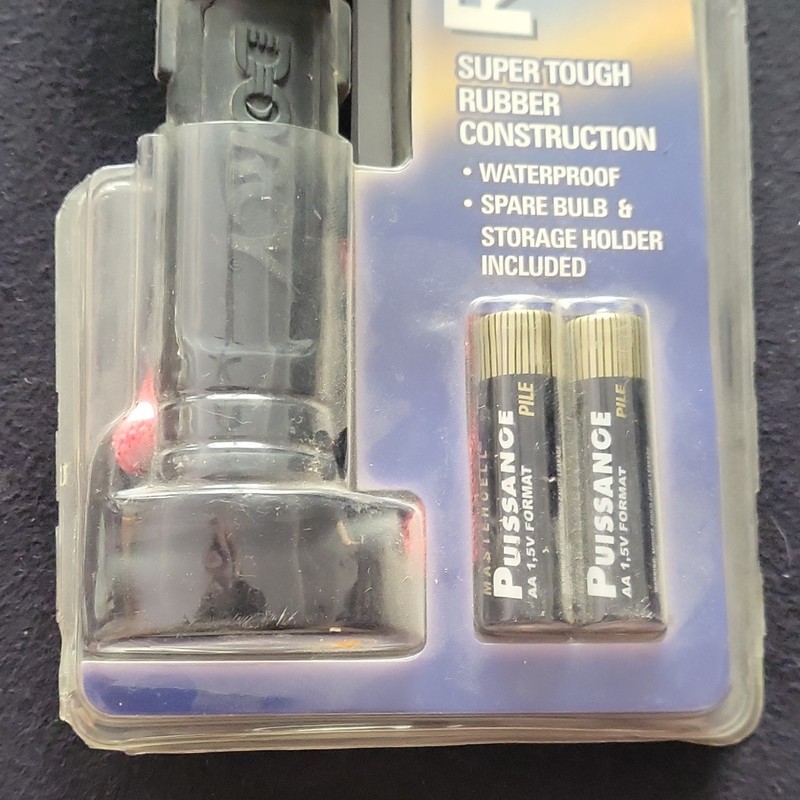 Rubber Waterproof Flashlight, 2 AA Batteries Included gallery