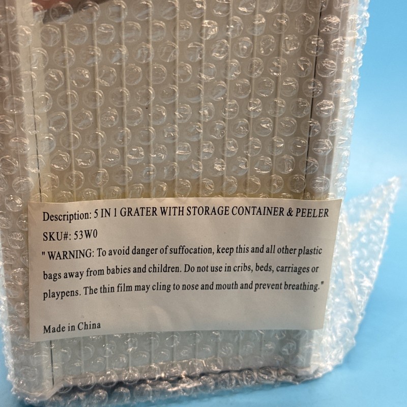 5 in 1 Grater with Storage Container and Peeler SKU 53W0 gallery