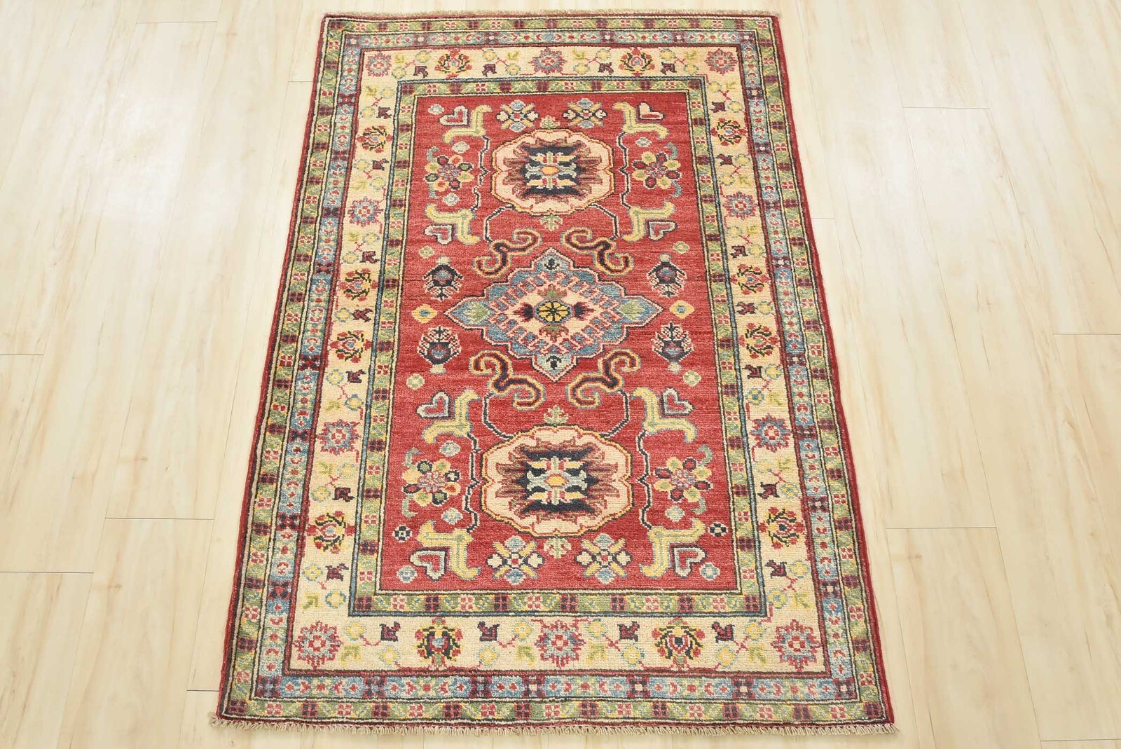 Geometric Kazak 3’4” x 4’9” Red Wool Tribal Hand-Knotted Oriental Rug gallery