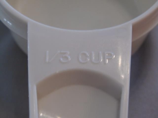 Tupperware 5 Piece Set Almond Nesting Stacking Measuring Cups 1/4 Cup to 1 Cup gallery