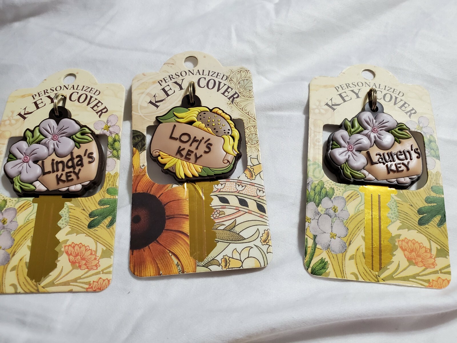 PERSONALIZED KEY COVERS NAMES THAT START WITH L,P ,M & V gallery