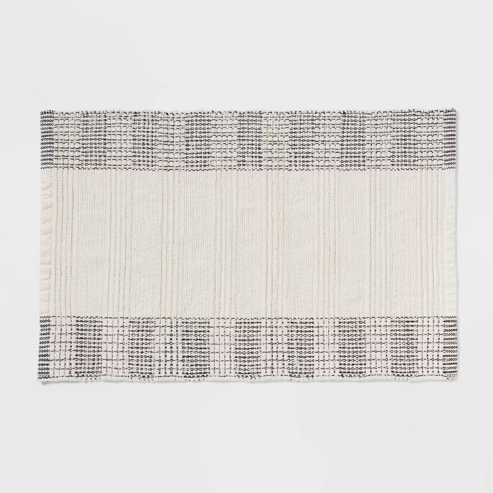 24"x36" Oversized Modern Chenille Bath Rug Black/White - Threshold gallery