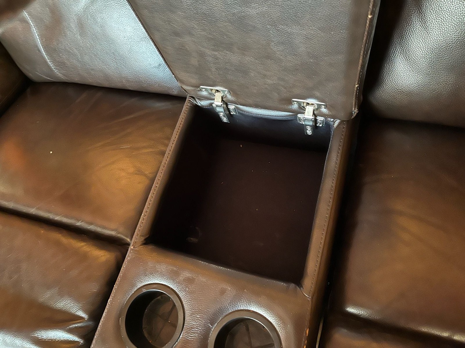 Dark Brown Power Reclining Loveseat with Center Storage Console and Cup Holders gallery