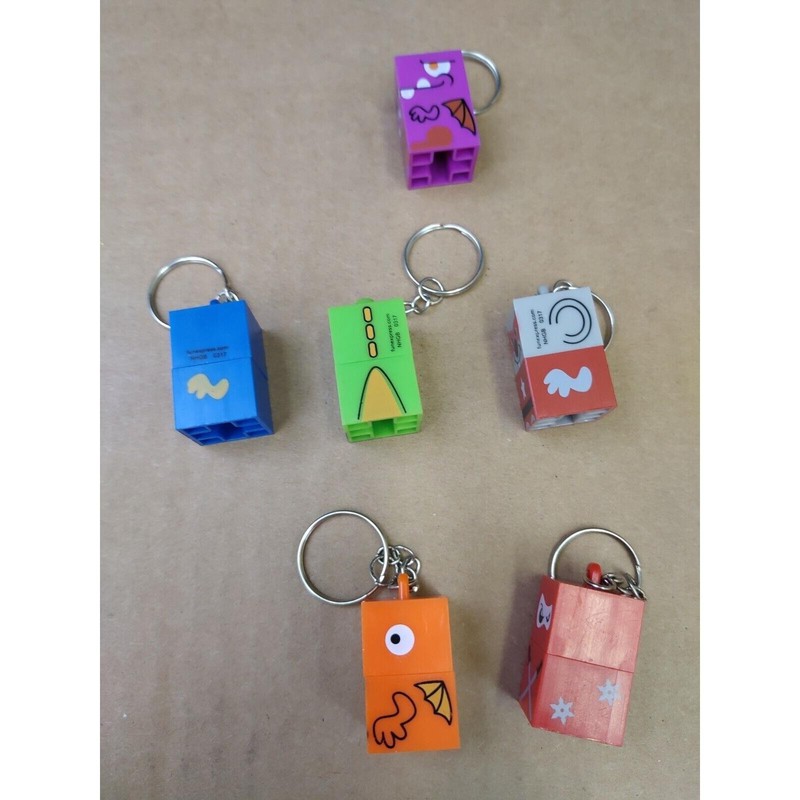Stackerz Building Block Dinosaurs Character Key Chains 2 pieces lot of 6 gallery