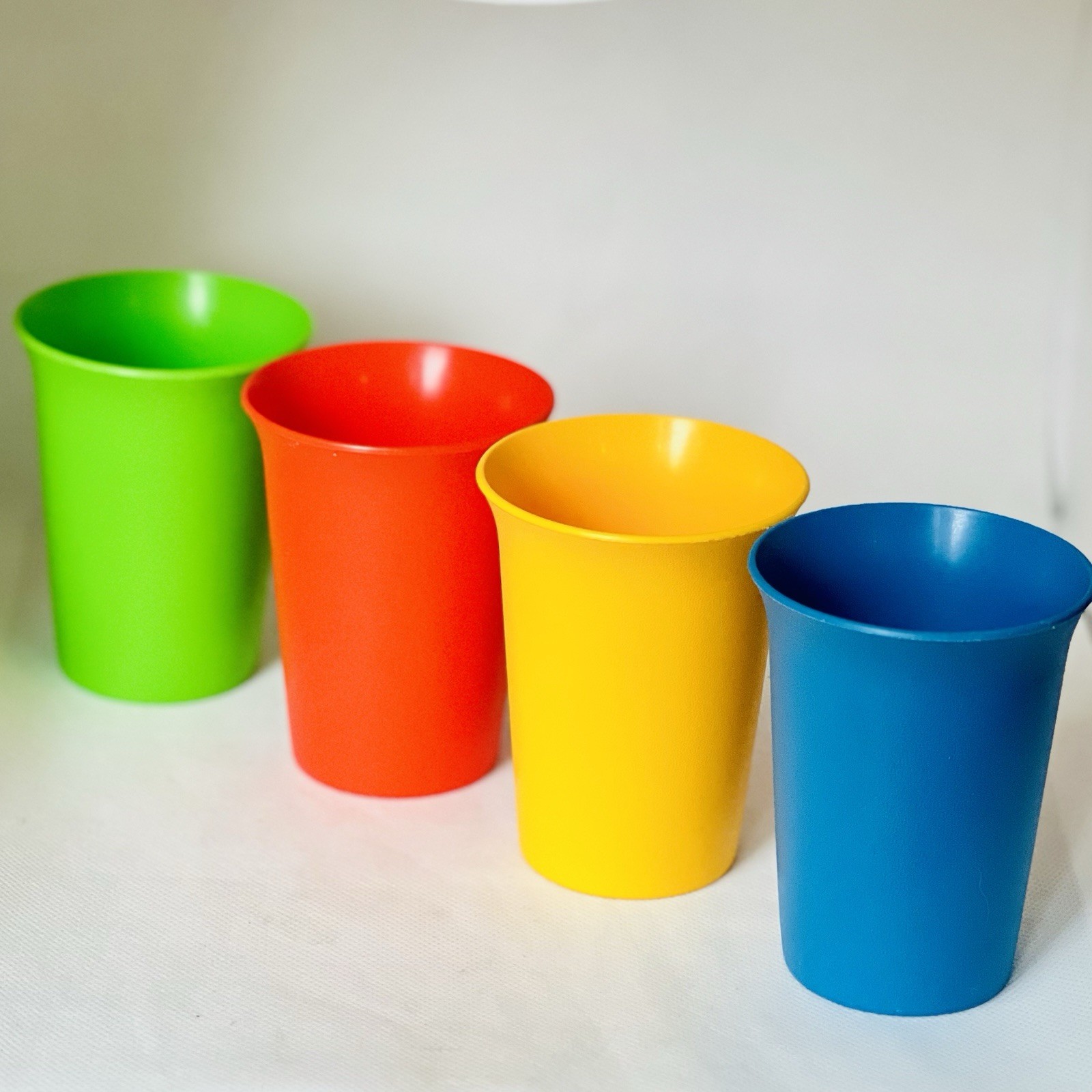 VINTAGE Tupperware Kids Small Juice Cups Primary Color Bell Tumblers Set of 4 gallery
