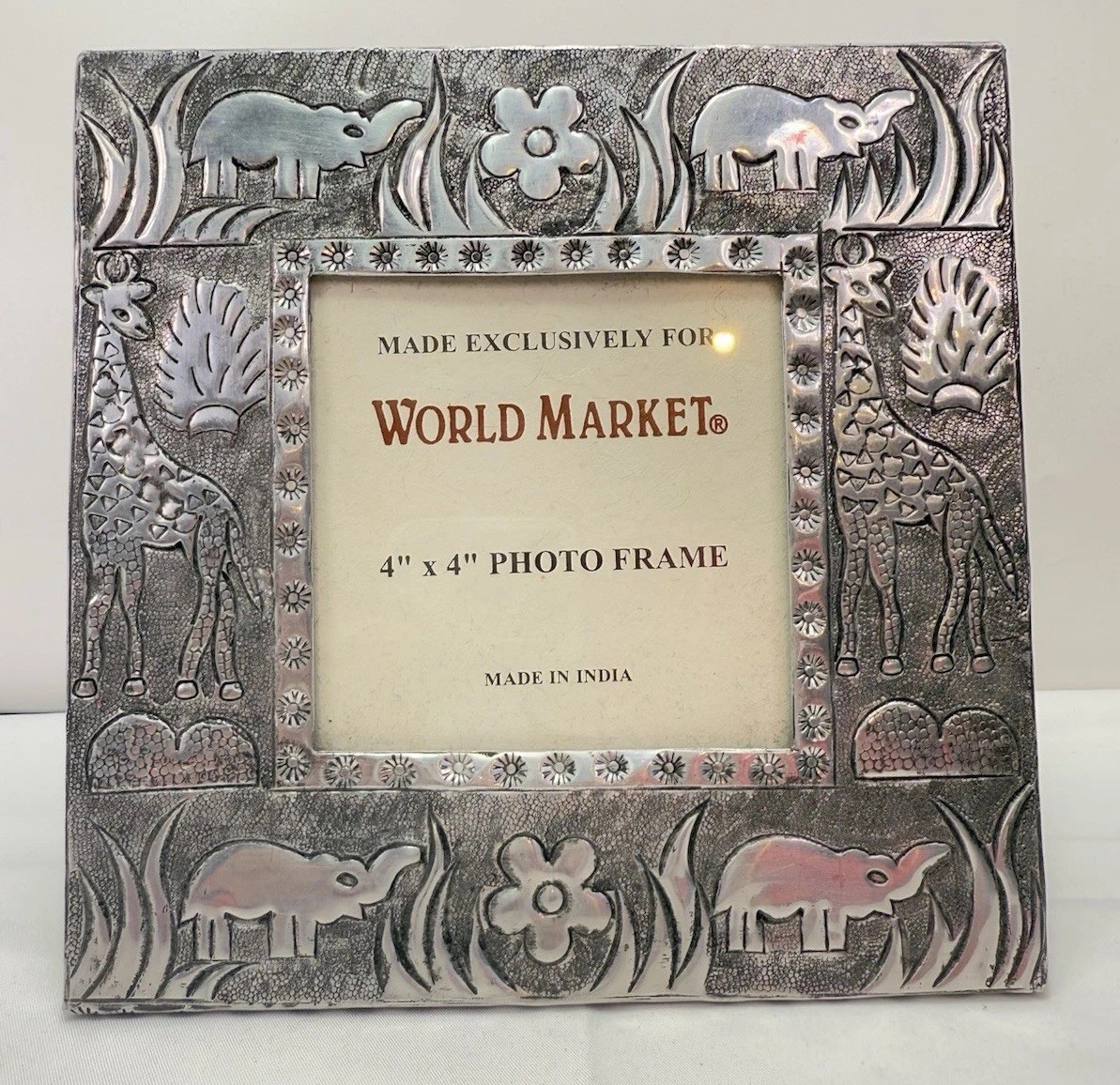 World Market Rustic Embossed Hand Hammered Metal Picture Frame African Animal 4” gallery