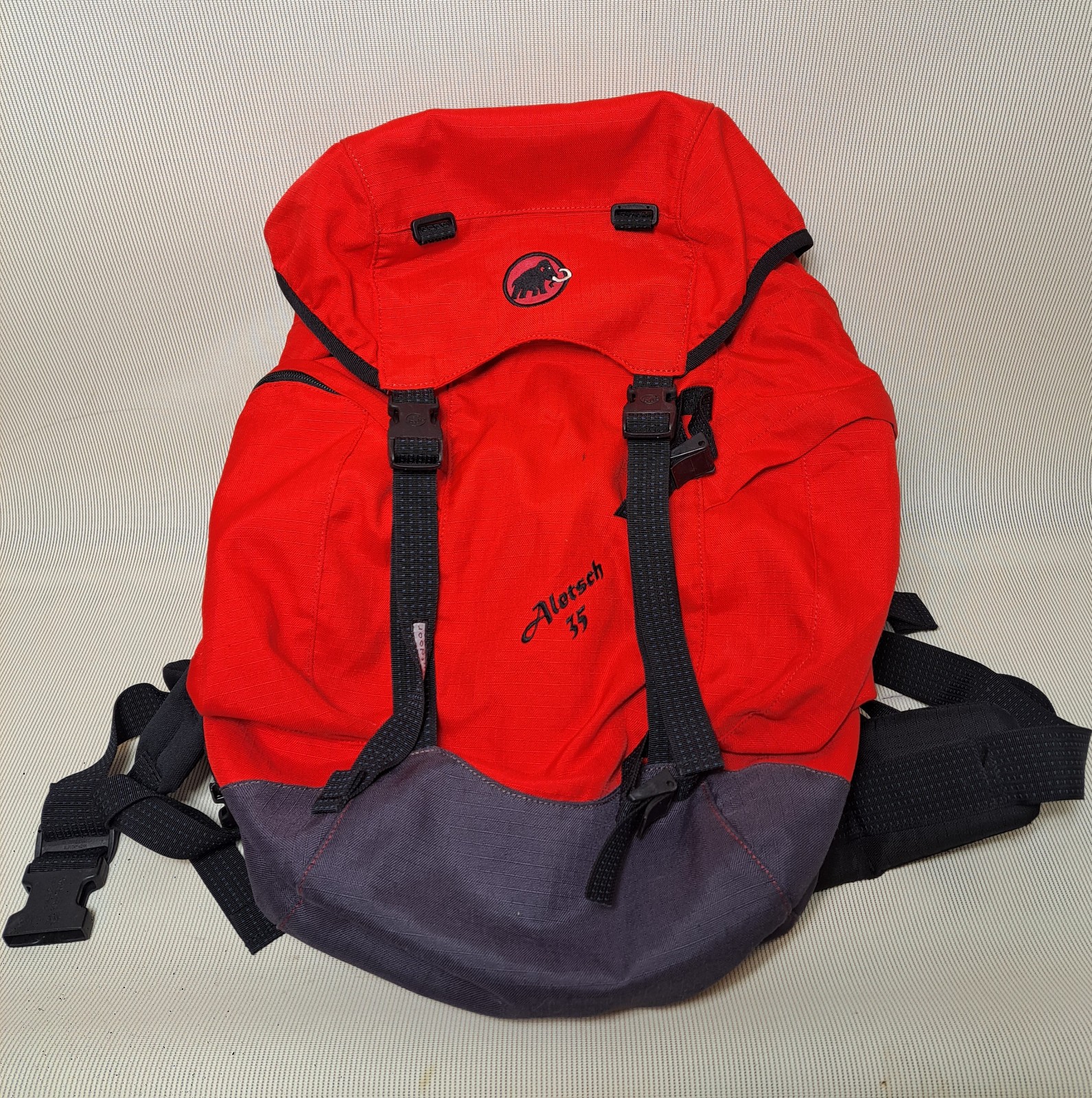MAMMUT Aletsch 35L Backpack (Black/Red) with back support frame.