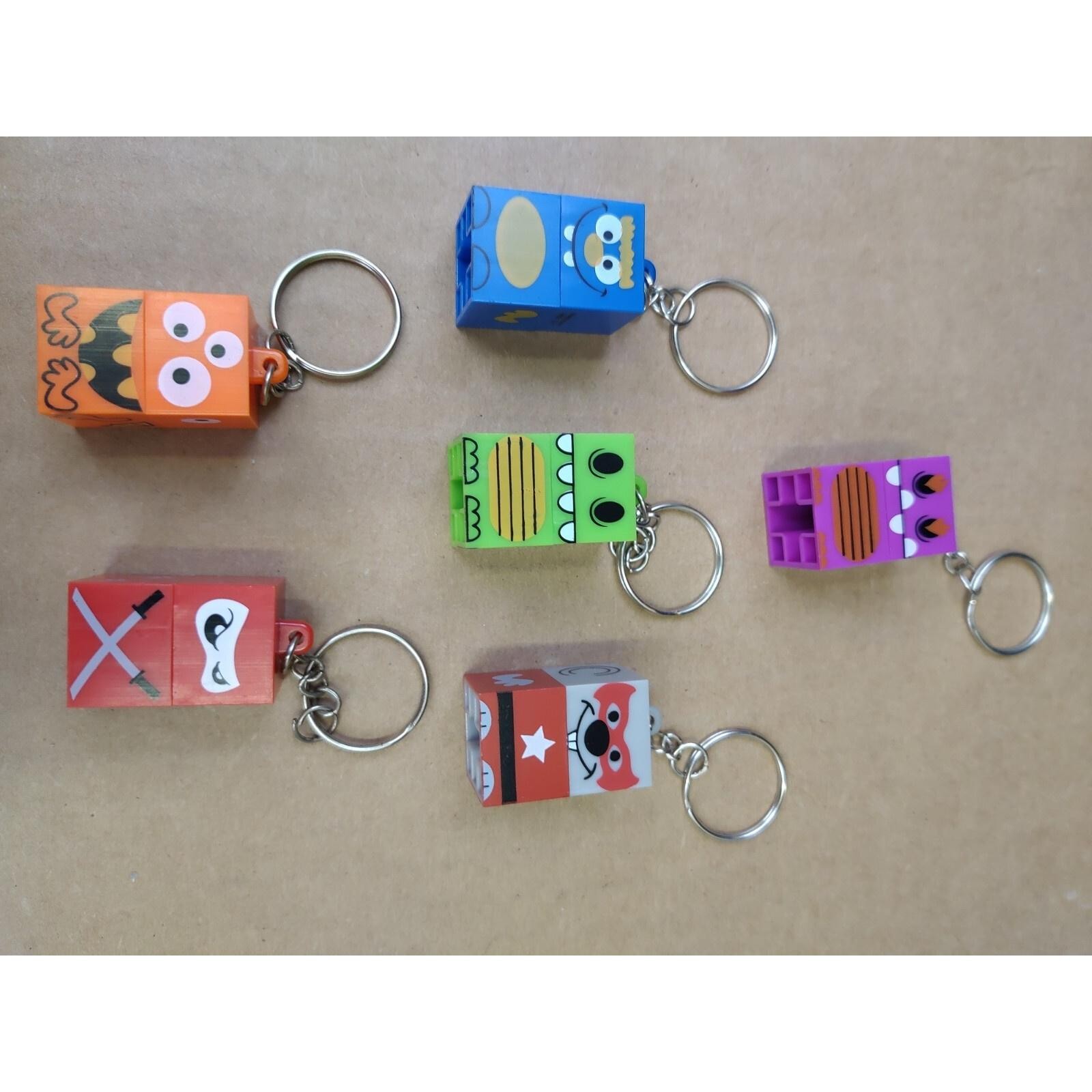 Stackerz Building Block Dinosaurs Character Key Chains 2 pieces lot of 6 gallery