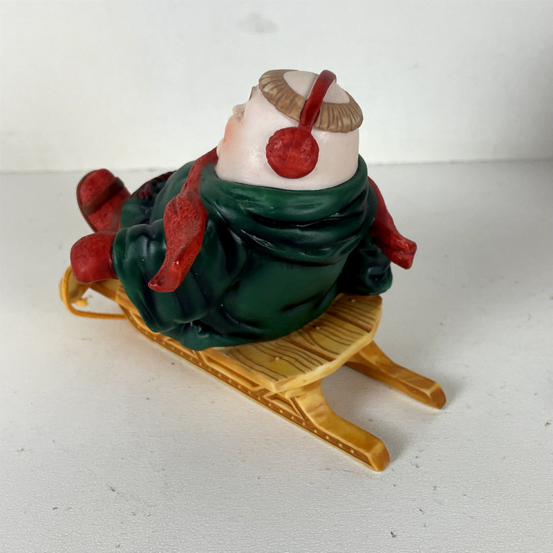 Dept 56 Solomon the Sledder MerryMakers Christmas Figurine 5in Ceramic gallery
