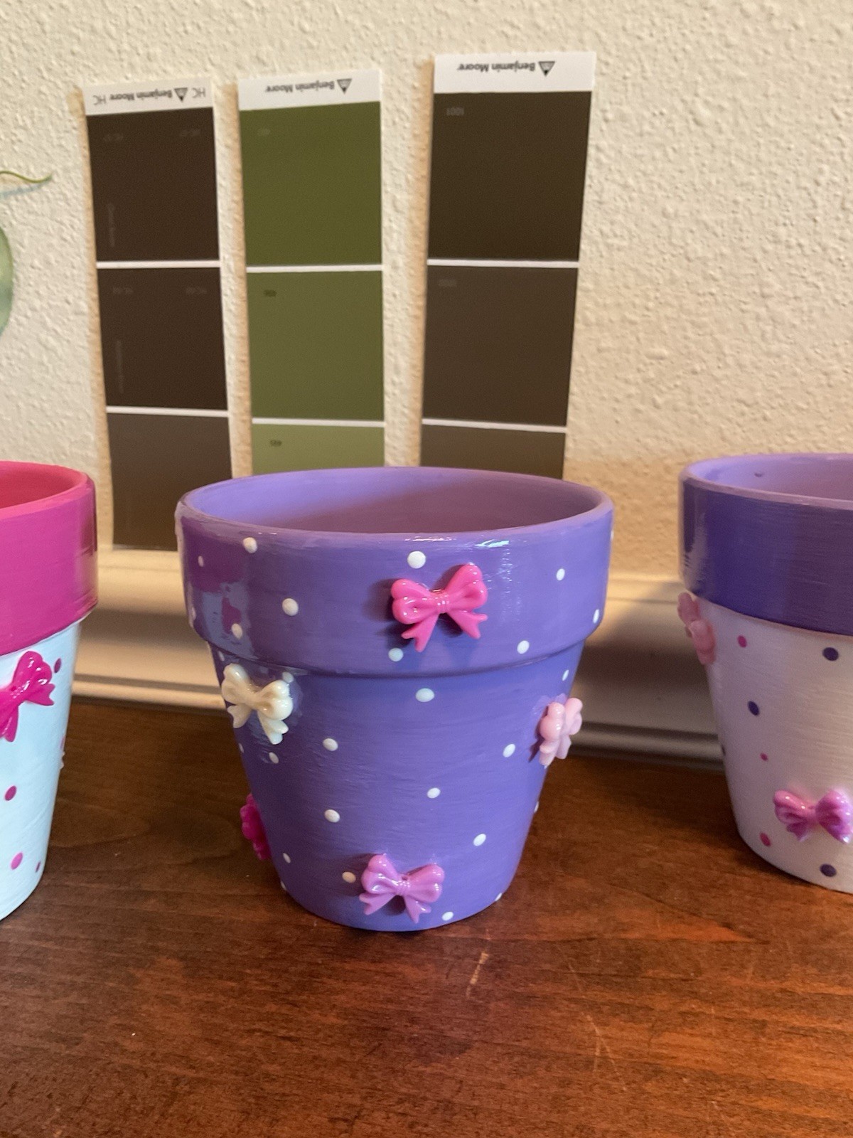 Hand Painted 3D Bow Design Clay Pot For Indoor Use Only 3” Gloss Glaze Sealer gallery
