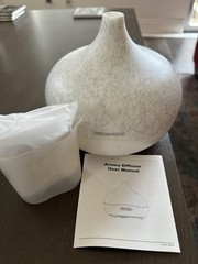 Oils and Aroma Diffuser Never Used With User Manual including (sealed new) oils