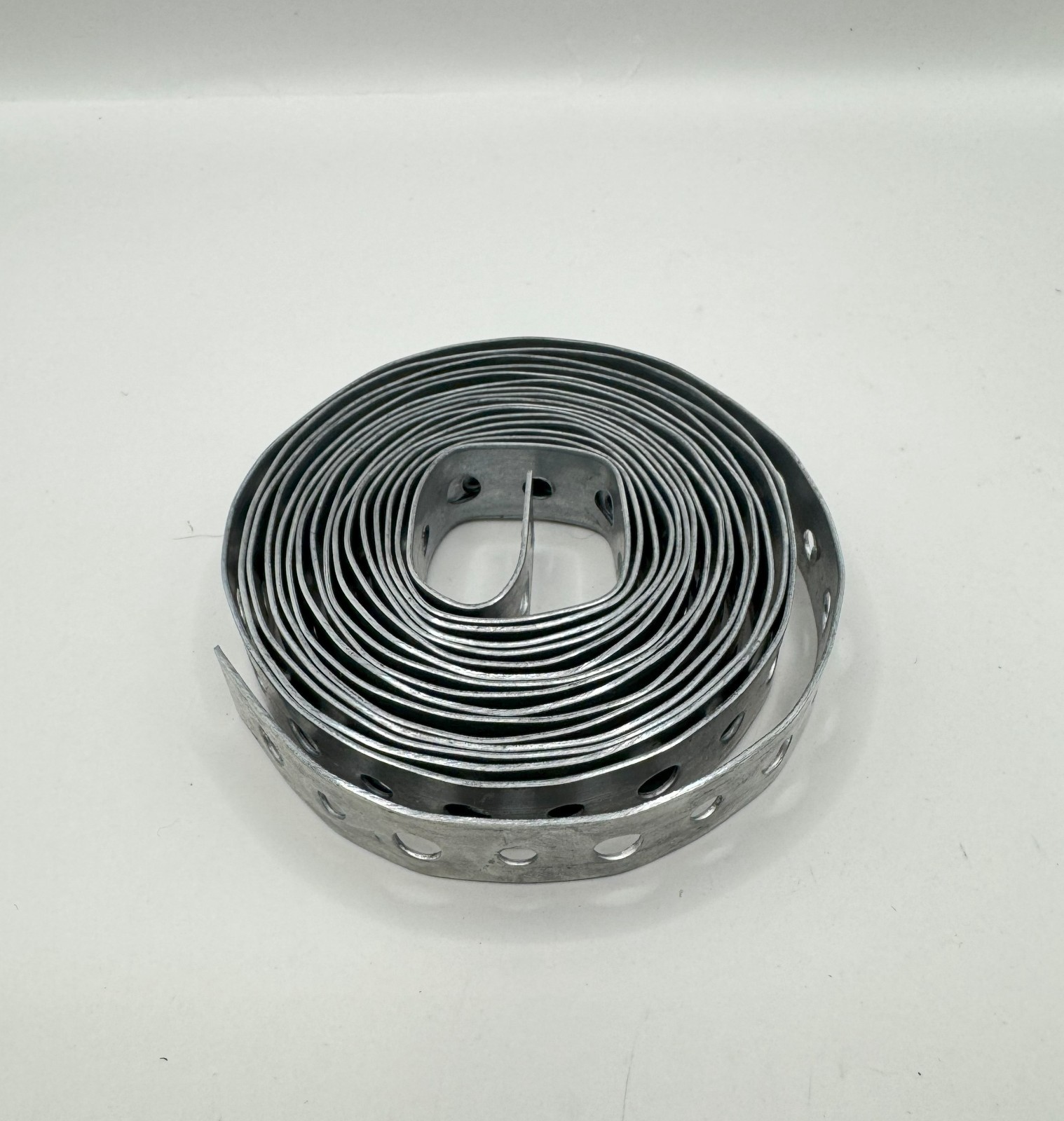 Galvanized Plumbers Tape – Perforated Metal Hanger Strap–3/4"x10 feet (28 Guage) gallery