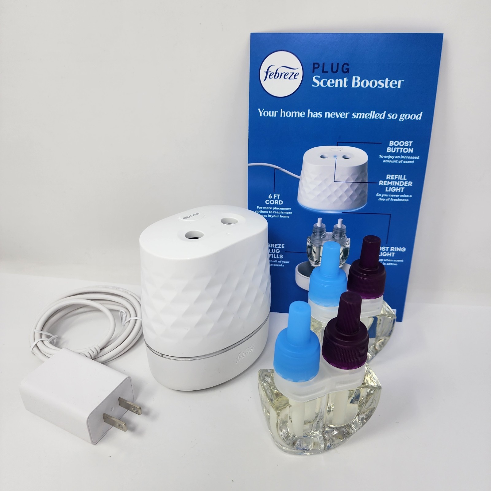 Febreze Plug Scent Booster Starter Kit Oil Diffuser+ 2 Downy Calm Refills gallery