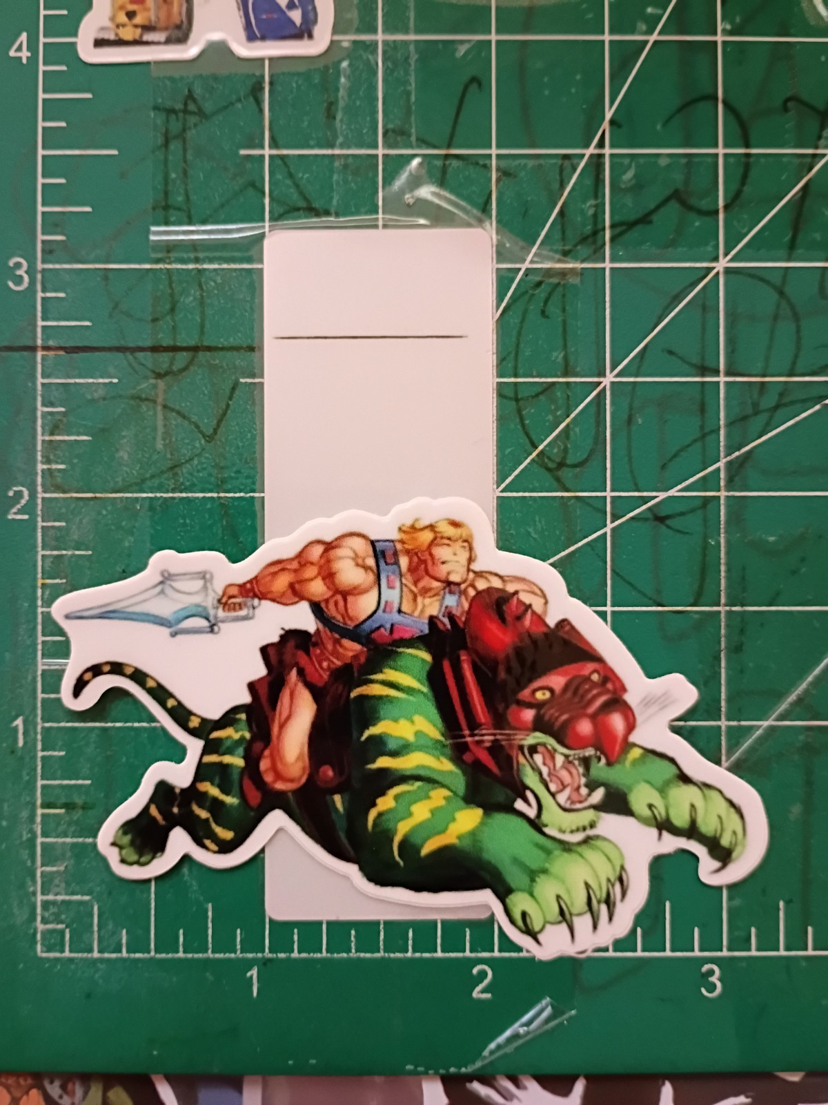 HE-MAN STICKER X VYNIL HIGH GLOSS DIECUT STICKER X 3X2 INCHES STICKER gallery