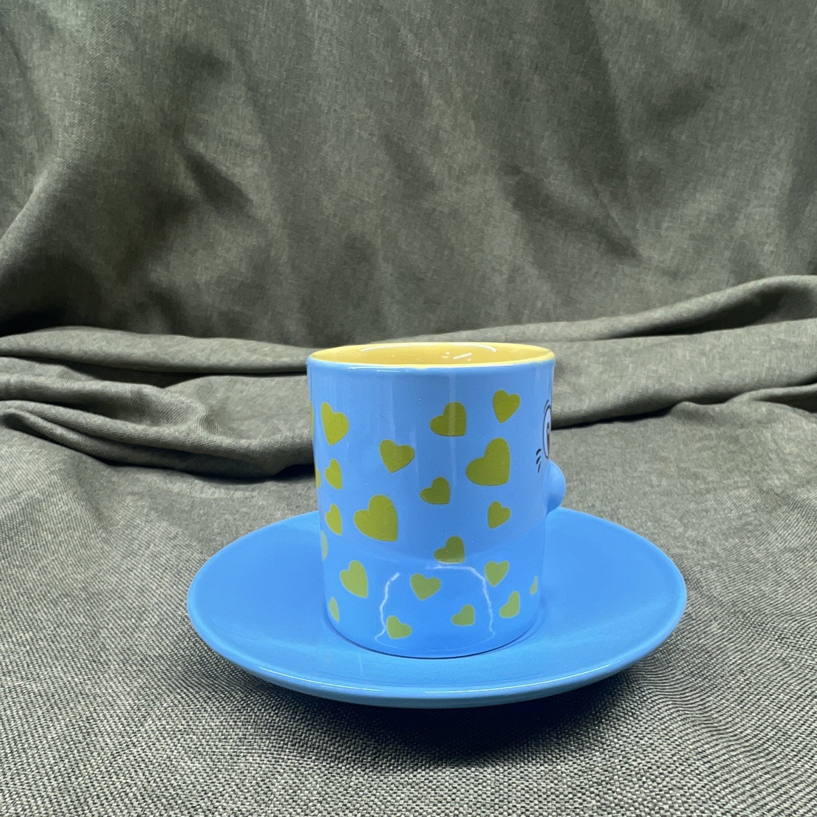 Blue/Yellow/Green Ceramic Tea Cup & Saucer 2-Piece Set, Decorated Hearts Face gallery