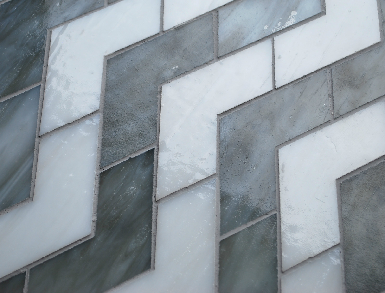 CHEVRON GREY WITH WHITE GLASS MOSAIC TILE BACKSPLASH WALL gallery
